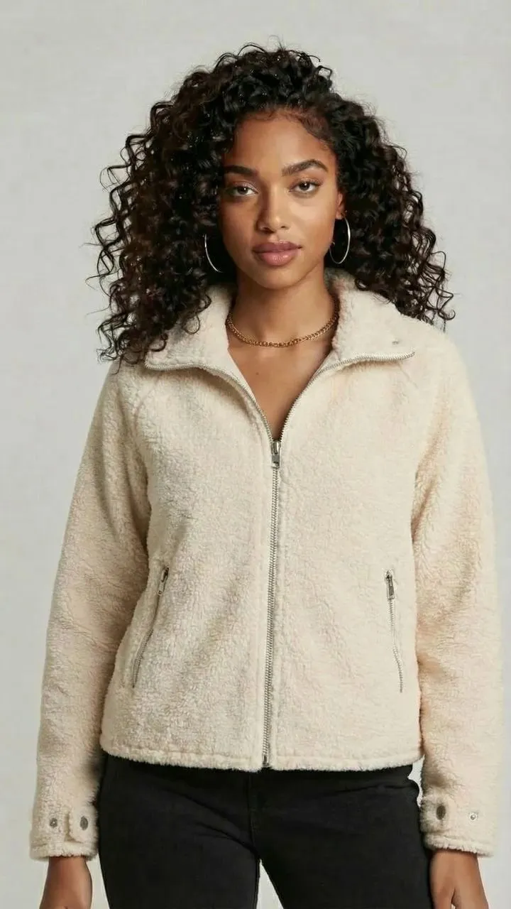 Riverflow 2.0 Pro Edit: Change to a natural, realistic style, the woman depicted in Figure 1 is now wearing the coat from Figure 2 — a
